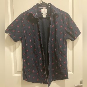 Mens short sleeve button up shirt. Black with flamingos. Size small.